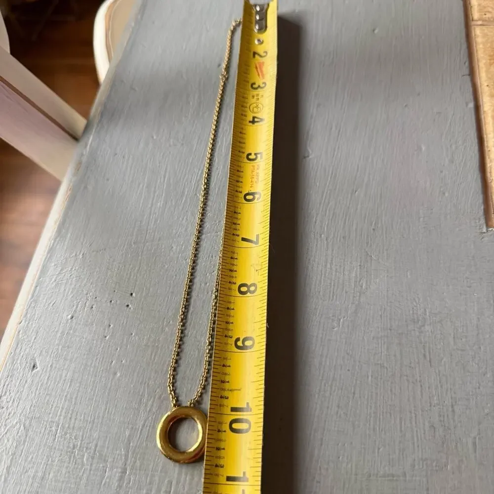 Michael Kors Gold Tone Ring Pendant Necklace